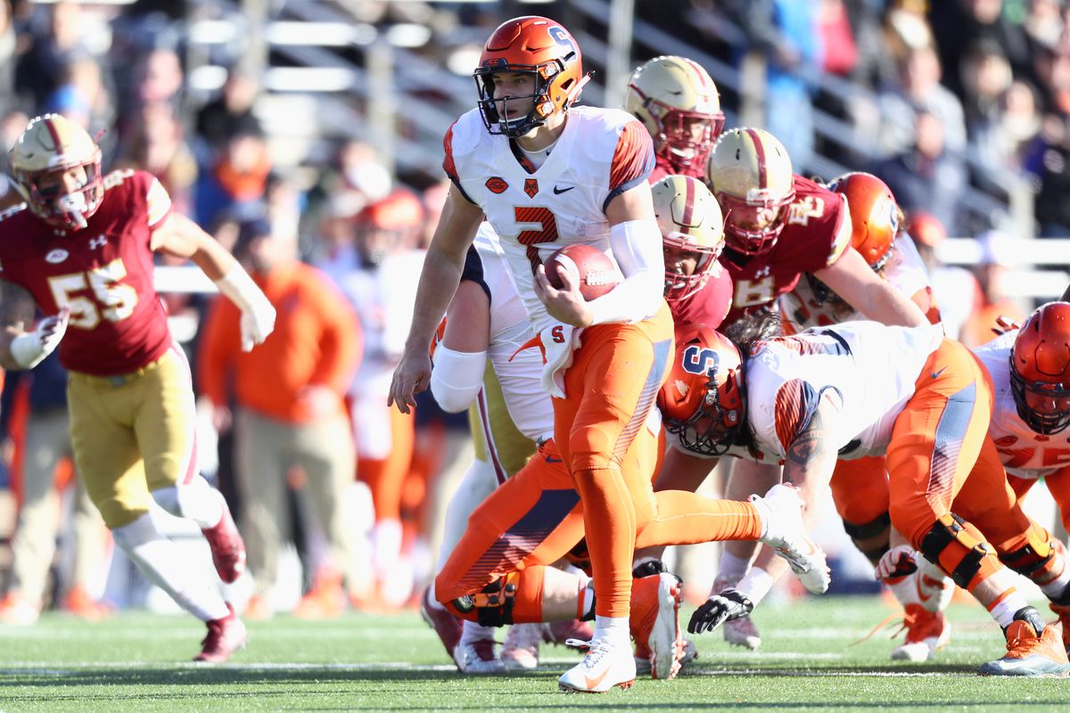 Quarterback Eric Dungey #2 of the Syracuse Orange rushes for a touchdown at the end of the second quarter of the game against the Boston College Eagles at Alumni Stadium on November 24, 2018 in Chestnut Hill, Massachusetts.