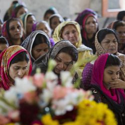 Pakistani Christian women mourn during the funeral service of Sahil Pervez who was killed in a suicide bombing attack, in Lahore, Pakistan, Monday, March 28, 2016. The death toll from a massive suicide bombing targeting Christians gathered on Easter in the eastern Pakistani city of Lahore rose on Monday as the country started observing a three-day mourning period following the attack. 