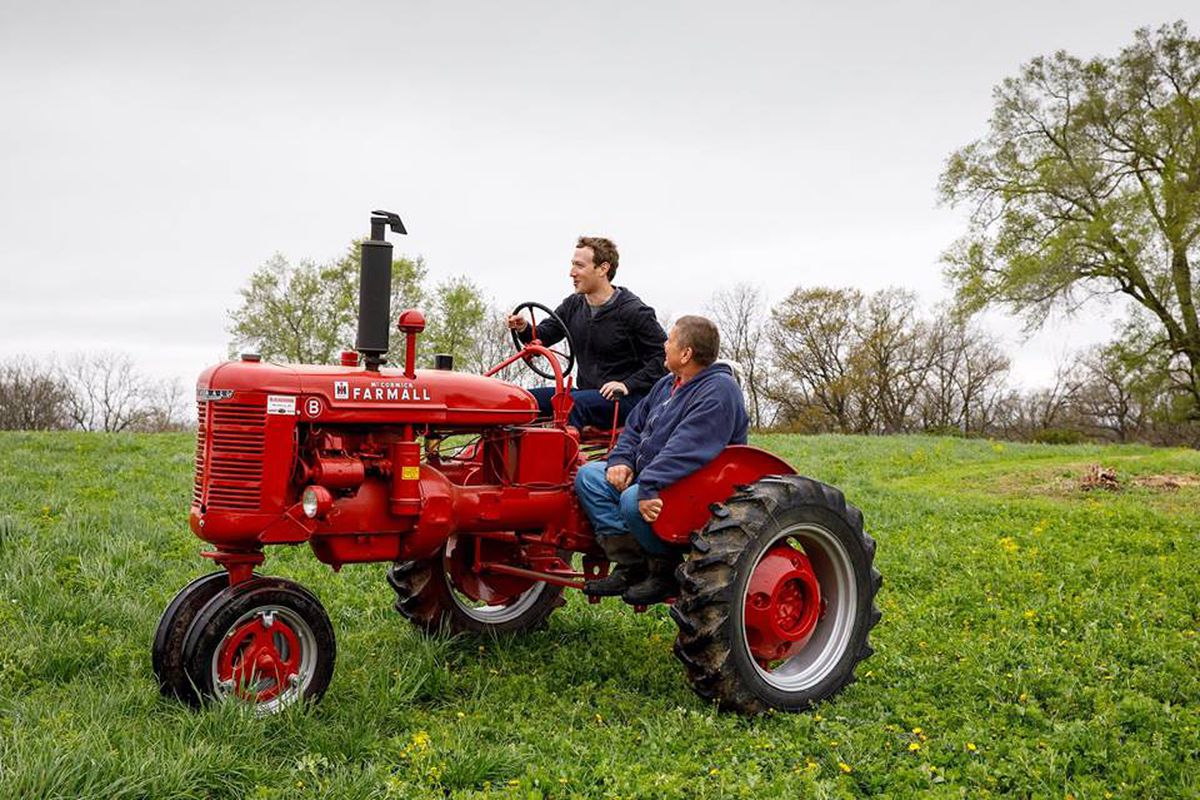Facebook CEO Mark Zuckerberg driving a tractor