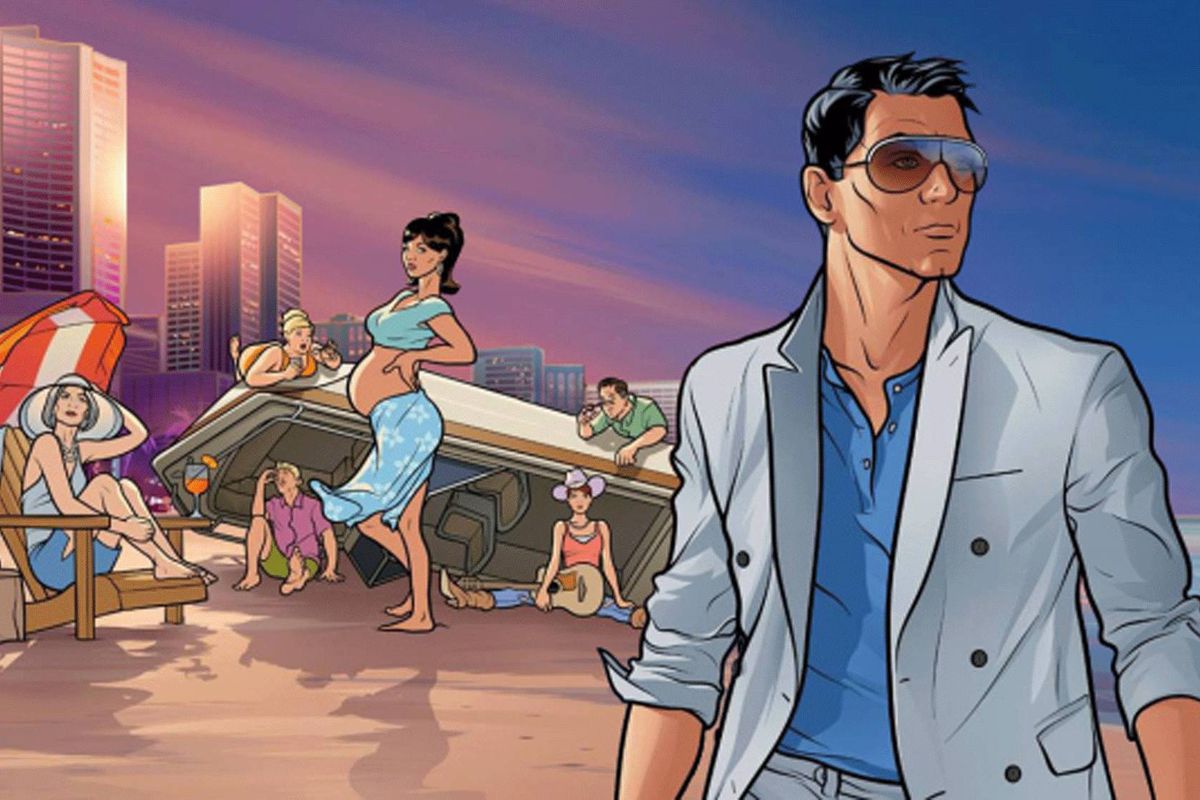 Sterling Archer faces the camera in a white suit on a beach with Lana and Mallory in the background