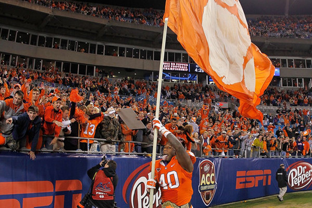 Andre Branch #40 of the Clemson Tigers celebrates winning the ACC Championship game against the Virginia Tech Hokies.