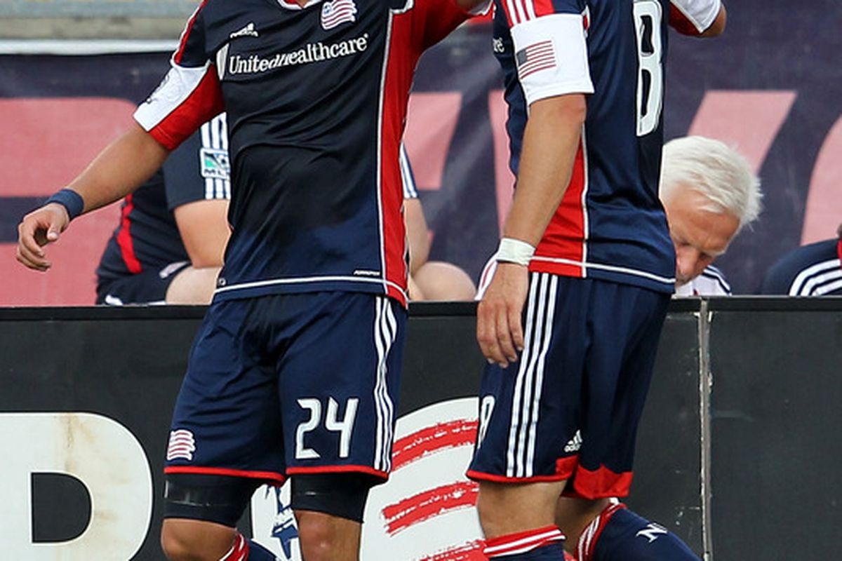 FOXBORO, MA - JULY 8:  Lee Nguyen #24 of the New England Revolution celebrates his goal with Chris Tierney #8 against the New York Red Bulls at Gillette Stadium on July 8, 2012 in Foxboro, Massachusetts. (Photo by Jim Rogash/Getty Images)
