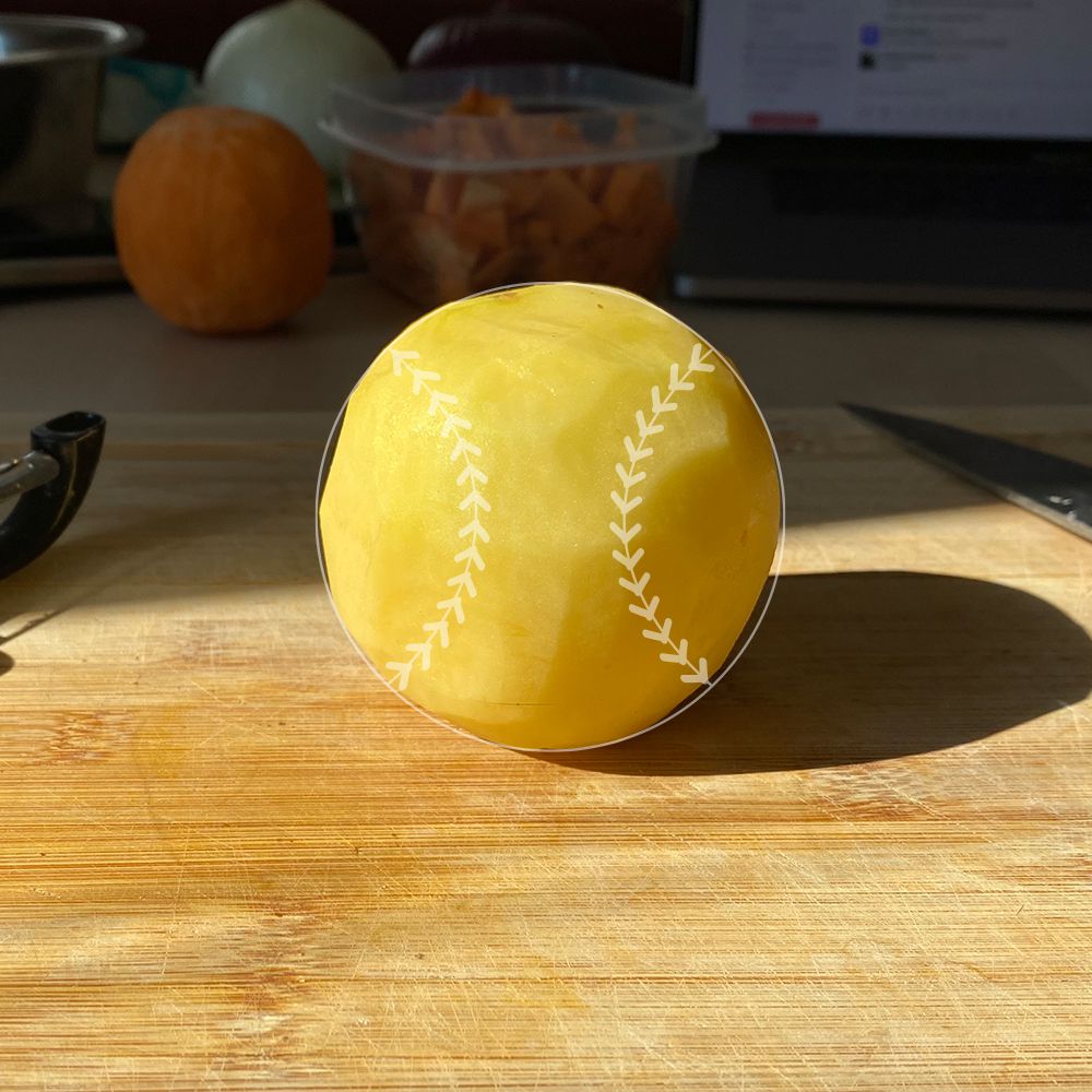 a potato carved into a baseball