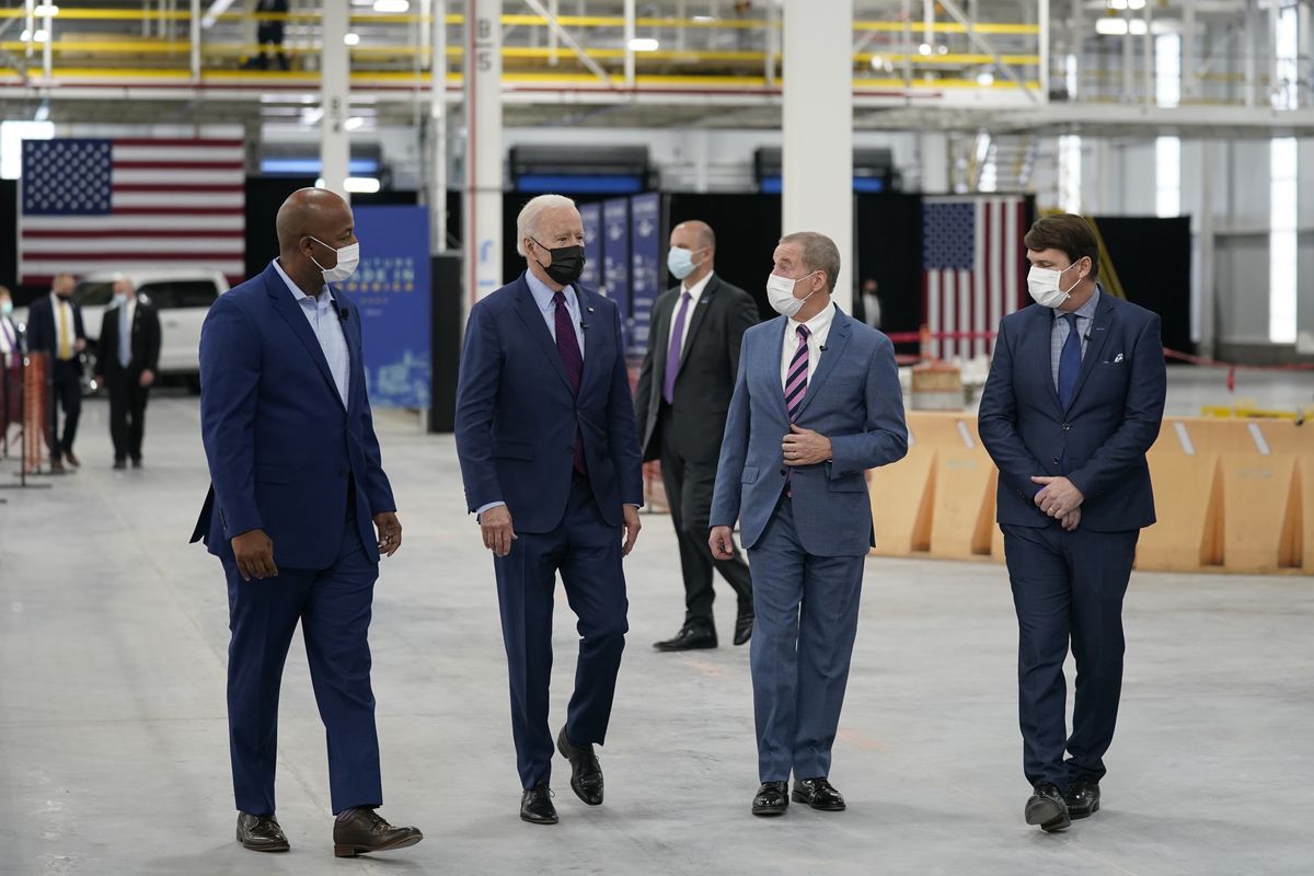 President Joe Biden tours the Ford Rouge EV Center, Tuesday, May 18, 2021, in Dearborn, Mich. From left, Corey Williams, plant manager, Biden, William “Bill” Ford, Jr., Executive Chairman, Ford Motor Company and Jim Farley, CEO, Ford Motor Company.