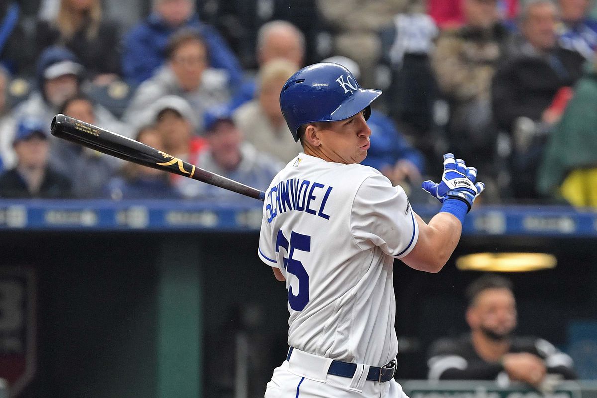 Kansas City Royals first baseman Frank Schwindel (25) singles in a run during the sixth inning against the Chicago White Sox at Kauffman Stadium.