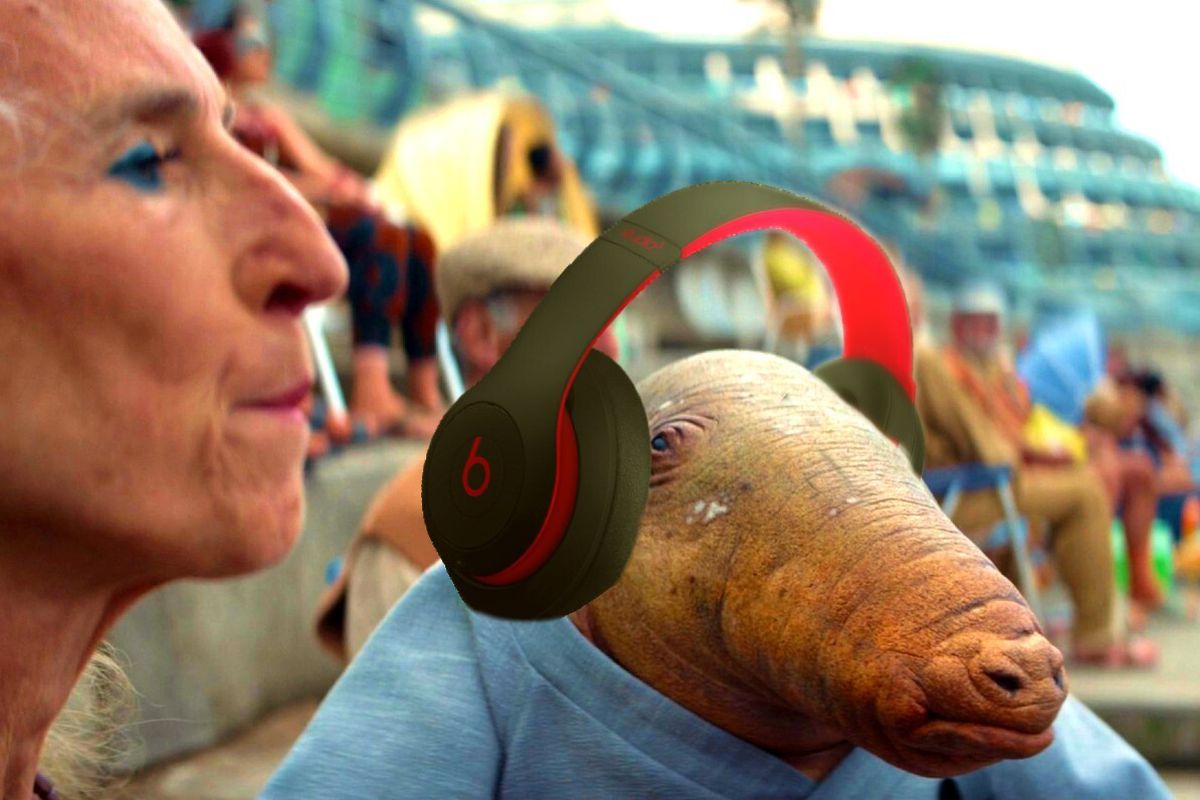 An alien in Andor episode 7 photoshopped to be wearing Beats headphones