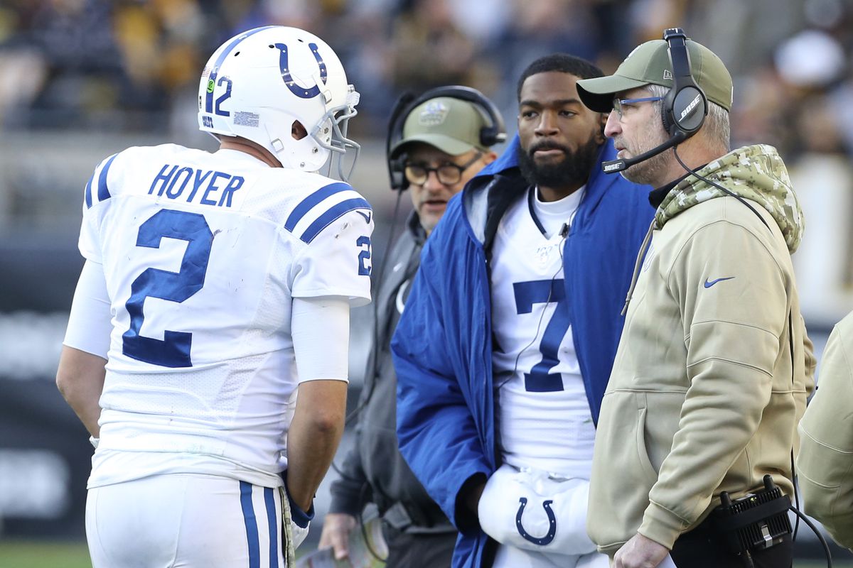 Indianapolis Colts quarterbacks Brian Hoyer and Jacoby Brissett talk with head coach Frank Reich on the sidelines against the Pittsburgh Steelers during the fourth quarter at Heinz Field.