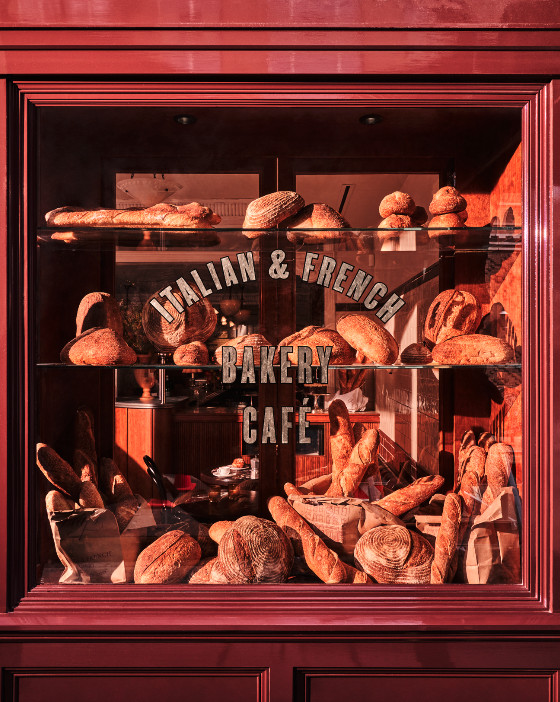 A bakery window for Raf’s filled with breads.