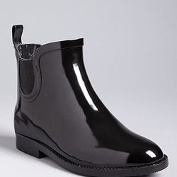 Ted Baker's Chelsea Rainboot, $110 at <a href="http://www1.bloomingdales.com/shop/product/ted-baker-chelsea-rain-boots-jeqan-bootie?ID=651942&CategoryID=19192#fn=spp%3D1%26ppp%3D96%26sp%3D1%26rid%3D5">Bloomingdale's</a>