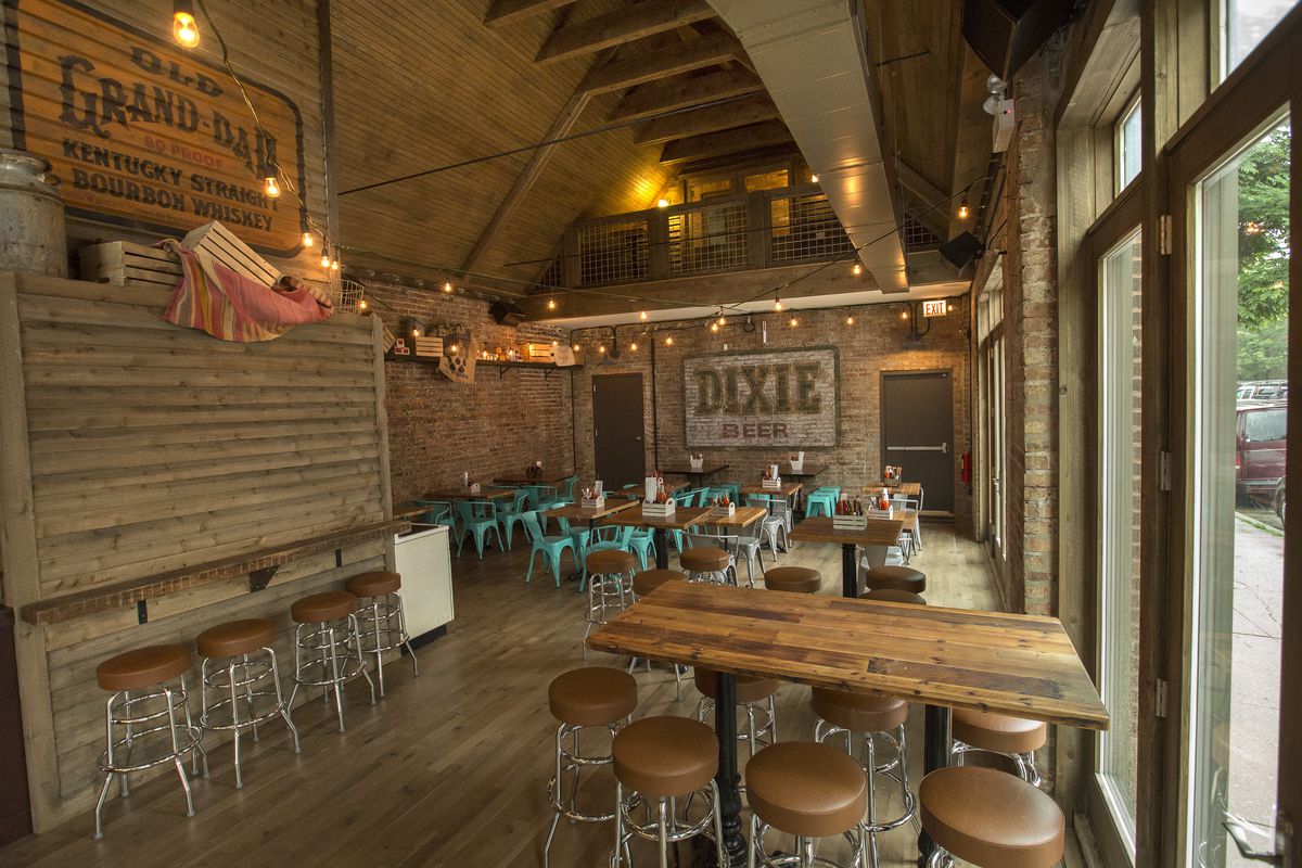A brown, wood-laden restaurant interior 