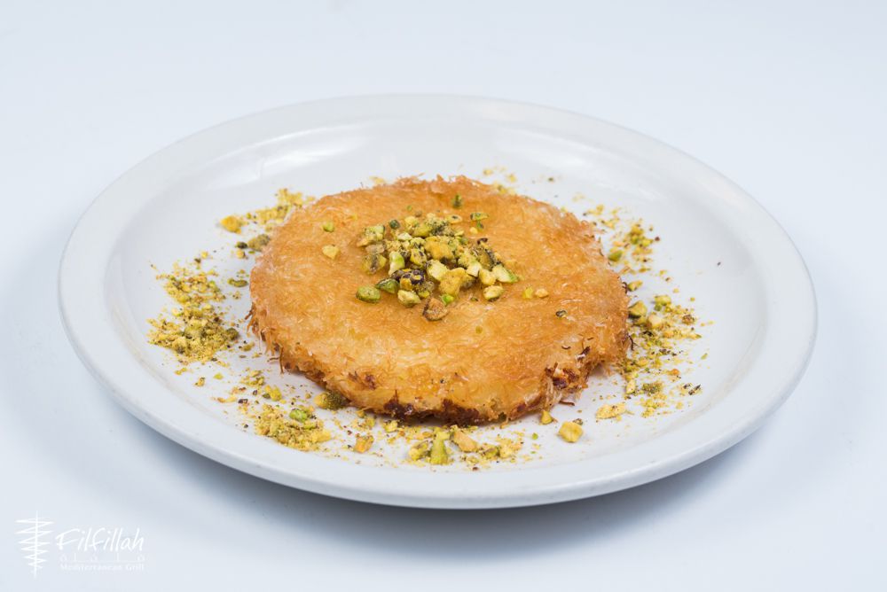 A white plate of knafeh. 