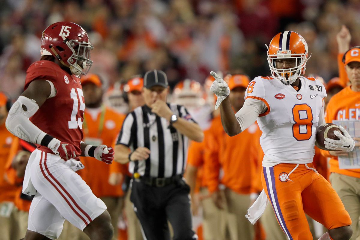 TAMPA:  Clemson Tigers wide receiver Deon Cain (8) taunts Alabama Crimson Tide defensive back Ronnie Hillman (15) after picking up a first down in the 2017 College Football Playoff National Championship Game at Raymond James Stadium.