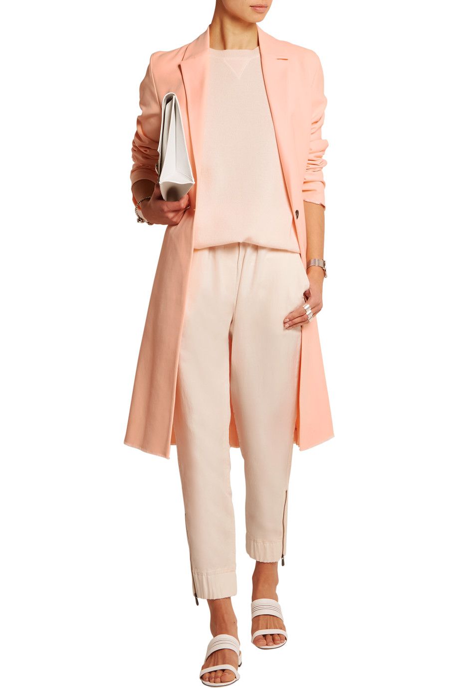A model in a pink crepe coat