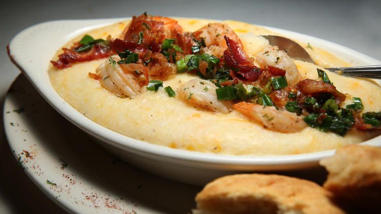 A bowl of shrimp and grits.