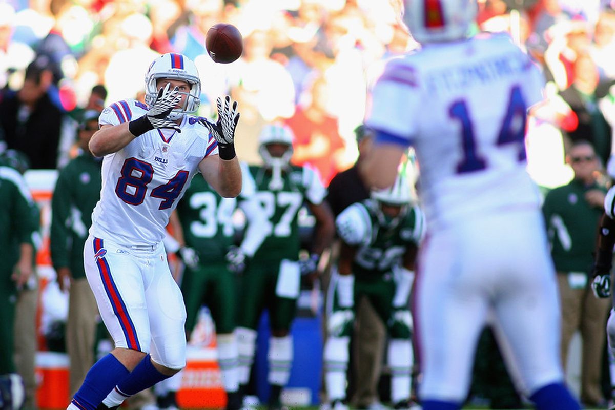 ORCHARD PARK, NY - NOVEMBER 06:Scott Chandler #84 of the Buffalo Bills makes a catch on a pass from Ryan Fitzpatrick #14 at Ralph Wilson Stadium on November 6, 2011 in Orchard Park, New York.New York won 27-11.  (Photo by Rick Stewart/Getty Images)
