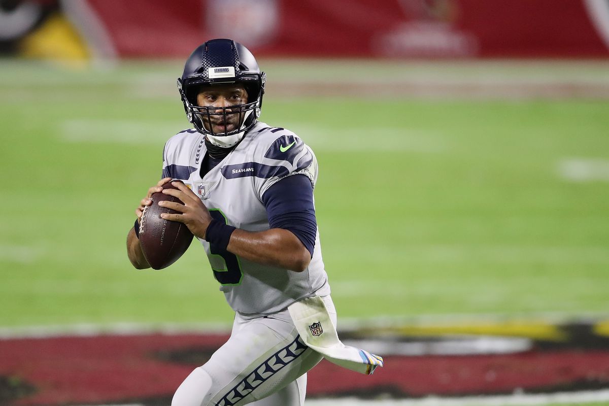 Quarterback Russell Wilson #3 of the Seattle Seahawks looks to pass during the NFL game against the Arizona Cardinals at State Farm Stadium on October 25, 2020 in Glendale, Arizona.