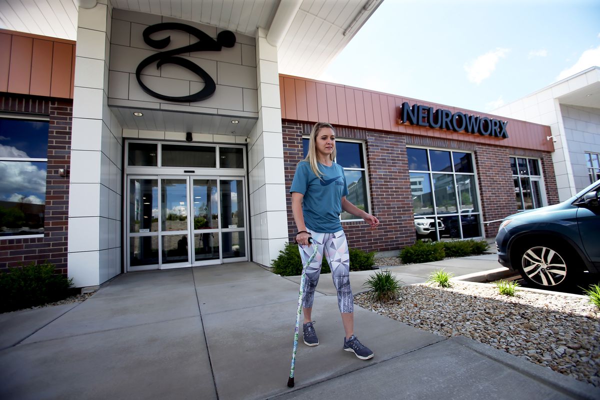 Kendal Levine, who was hit by a car while on a mission in Australia, makes her way to the car after physical therapy session at Neuroworx in Sandy on Thursday, April 25, 2019,
