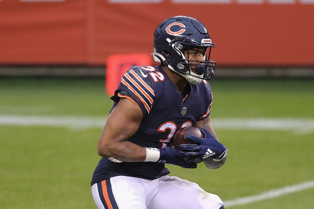 David Montgomery of the Chicago Bears runs against the Detroit Lions at Soldier Field on December 06, 2020 in Chicago, Illinois. The Lions defeated the Bears 34-30.