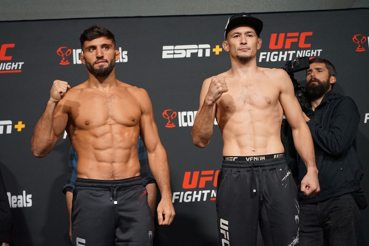 Arman Tsarukyan (L) vs. Damir Ismagulov (R) face off for the first time ahead of UFC Vegas 66 on December 16, 2022, at the UFC APEX in Las Vegas, NV.