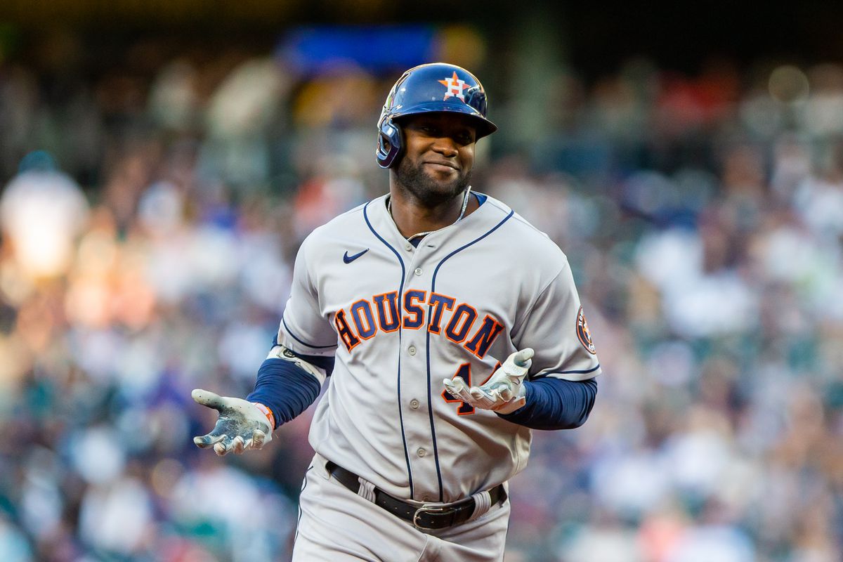 Houston Astros designated hitter Yordan Alvarez (44) gestures as he rounds the base after hitting a home run against the Seattle Mariners during the fourth inning at T-Mobile Park