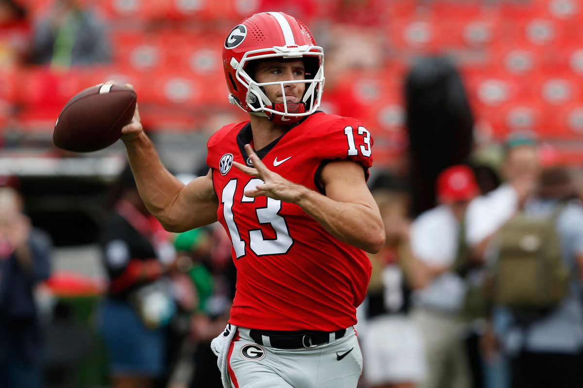 Georgia quarterback Stetson Bennett (13) warms up before the start of a NCAA college football game between Samford and Georgia