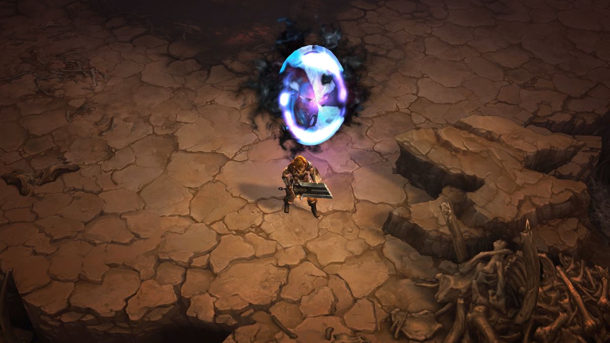 A Barbarian stands before a strange portal on a barren landscape in Diablo 3