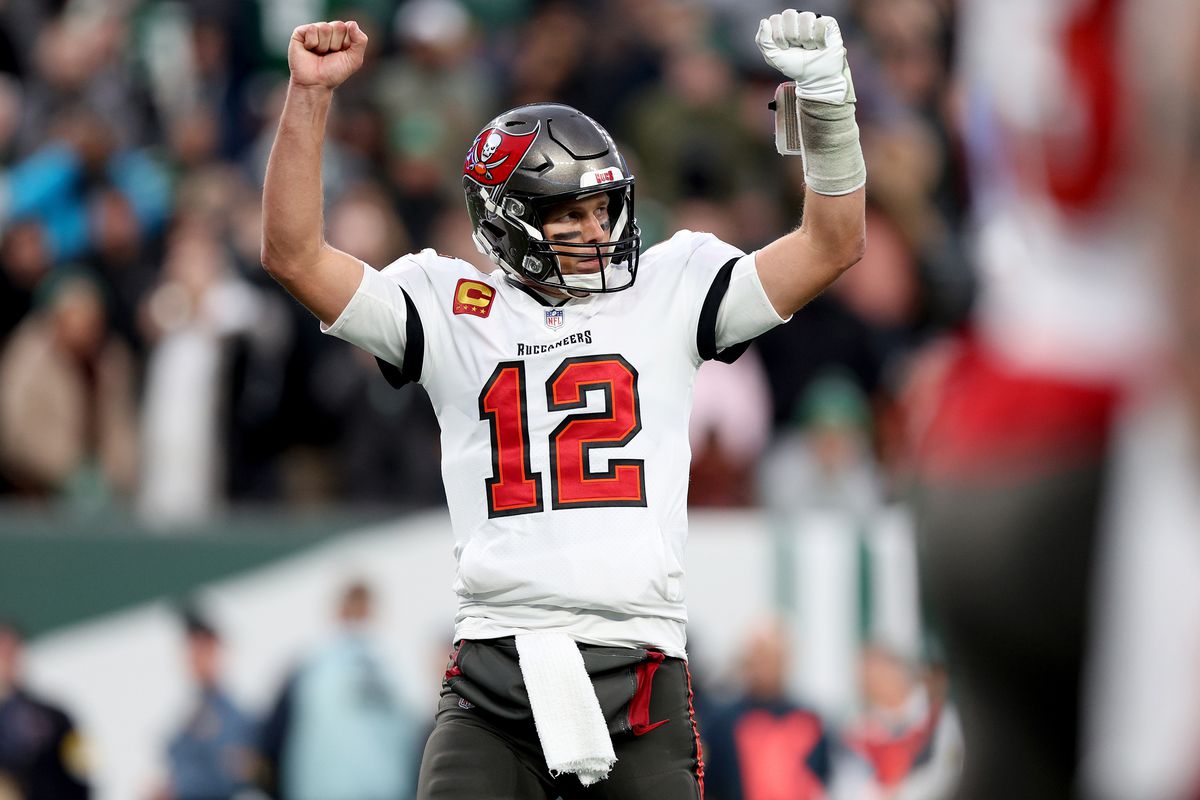 Tom Brady #12 of the Tampa Bay Buccaneers celebrates a successful two-point conversion in the fourth quarter of the game against the New York Jets at MetLife Stadium on January 02, 2022 in East Rutherford, New Jersey.