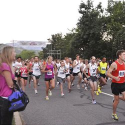 Runners participate in the Deseret News 10K race that started in Research Park and ended in Liberty Park in Salt Lake City Saturday.