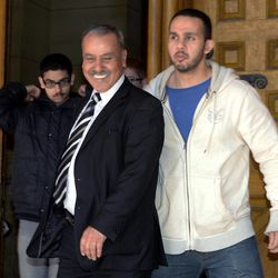 Family members of Raed Jaser, including father Mohammed Jaser, center, leave court in Toronto on Tuesday, April 23, 2013. Raed Jaser, accused with another of plotting to derail a train in Canada with support from al-Qaida elements in Iran, made a brief court appearance and was told to appear in court again next month. 