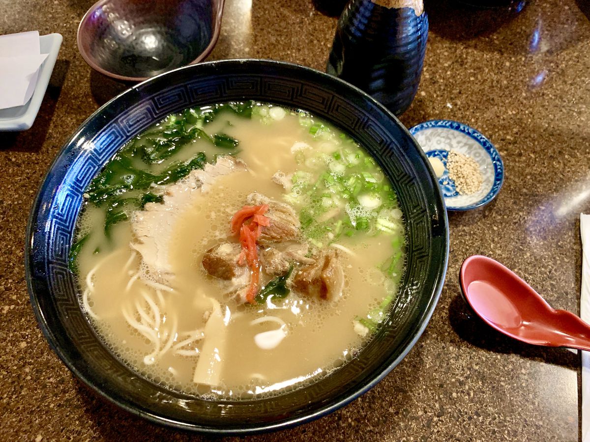 Bowl of ramen and a red spoon