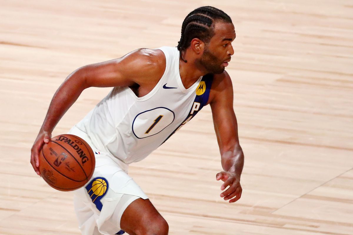 T.J. Warren of the Indiana Pacers dribbles against the Miami Heat during the second half of Game 3 of an NBA basketball first-round playoff series at AdventHealth Arena on August 22, 2020 in Lake Buena Vista, Florida.