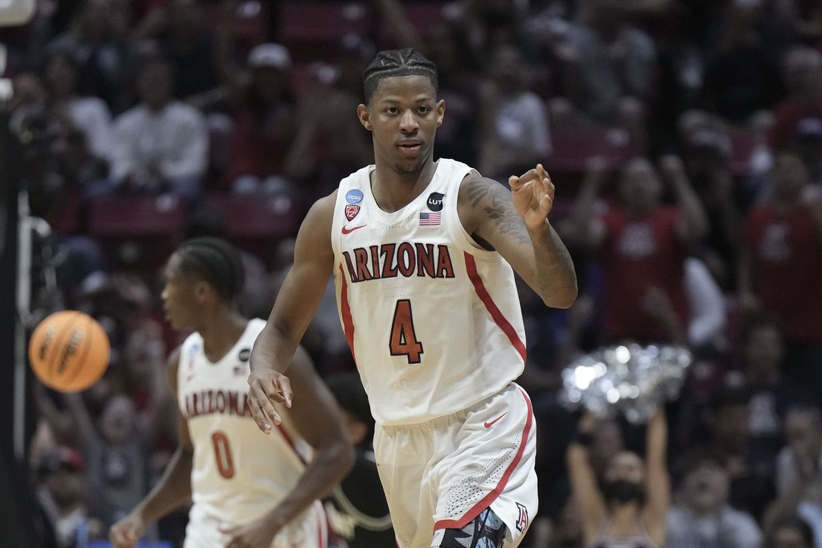 Arizona Wildcats guard Dalen Terry (4) celebrates against the Wright State Raiders during the second half during the first round of the 2022 NCAA Tournament at Viejas Arena.