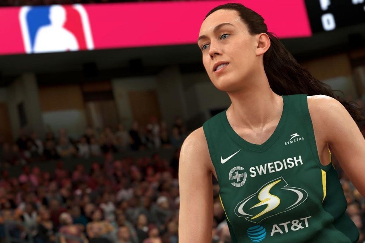 Closeup of WNBA star Breanna Stewart in uniform with a crowd in the background.