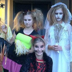 Five of the Luke sisters celebrate Halloween in 2012. The Lukes adopted five sisters from the Ukraine nearly doubling the size of  their family.