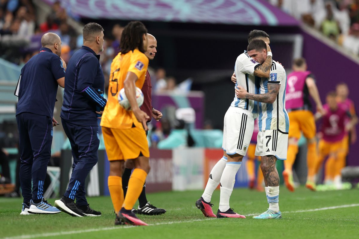 Rodrigo De Paul of Argentina is substituted by Leandro Paredes during the FIFA World Cup Qatar 2022 quarter final match between Netherlands and Argentina at Lusail Stadium on December 09, 2022 in Lusail City, Qatar.