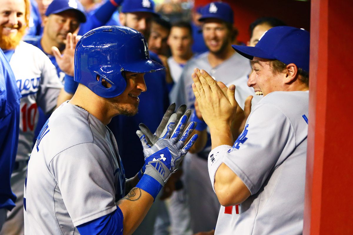 Yasmani Grandal and Kiké Hernandez, presumably when told they would start in Game 2.