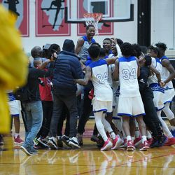 Curie’s team and fans run on the court after their win over Young, Friday 03-08-19. Worsom Robinson/For the Sun-Times.