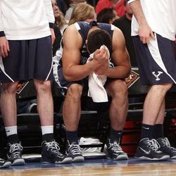 Brigham Young Cougars forward Bronson Kaufusi (44) hangs his head in the closing moments during the NIT Final Four in New York City Tuesday, April 2, 2013. BYU lost to Baylor 76-70.