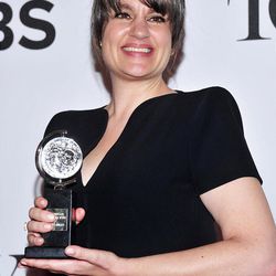 Pam MacKinnon poses with her award for best direction of a play for "Who's Afraid of Virginia Woolf?" in the press room at the 67th Annual Tony Awards, on Sunday, June 9, 2013 in New York.  (Photo by Charles Sykes/Invision/AP)