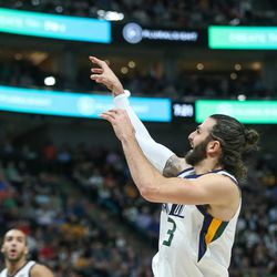 Utah Jazz guard Ricky Rubio (3) shoots during the game against the Golden State Warriors at Vivint Arena in Salt Lake City on Tuesday, April 10, 2018.