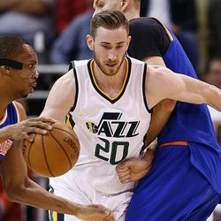 Utah Jazz forward Gordon Hayward (20) fights through a screen by New York Knicks forward Kristaps Porzingis (6) as he works to stay with New York Knicks forward Lance Thomas (42) as the Utah Jazz and the New York Knicks play at Vivint Arena in Salt Lake City on Wednesday, March 22, 2017. The Jazz beat the Knicks 108-101.