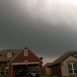 A storm cell lingers over Lindsey Fountain's home in Broken Arrow, Okla., on Monday, May 20, 2013.