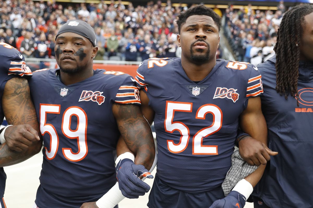 Bears linebackers Danny Trevathan and Khalil Mack link arms before the national anthem Sunday.