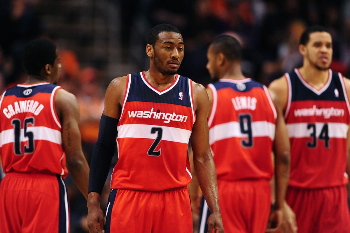 Feb. 20, 2012; Phoenix, AZ, USA; Washington Wizards guard (2) John Wall during game against the Phoenix Suns at the US Airways Center. The Suns defeated the Wizards 104-88. Mandatory Credit: Mark J. Rebilas-US PRESSWIRE