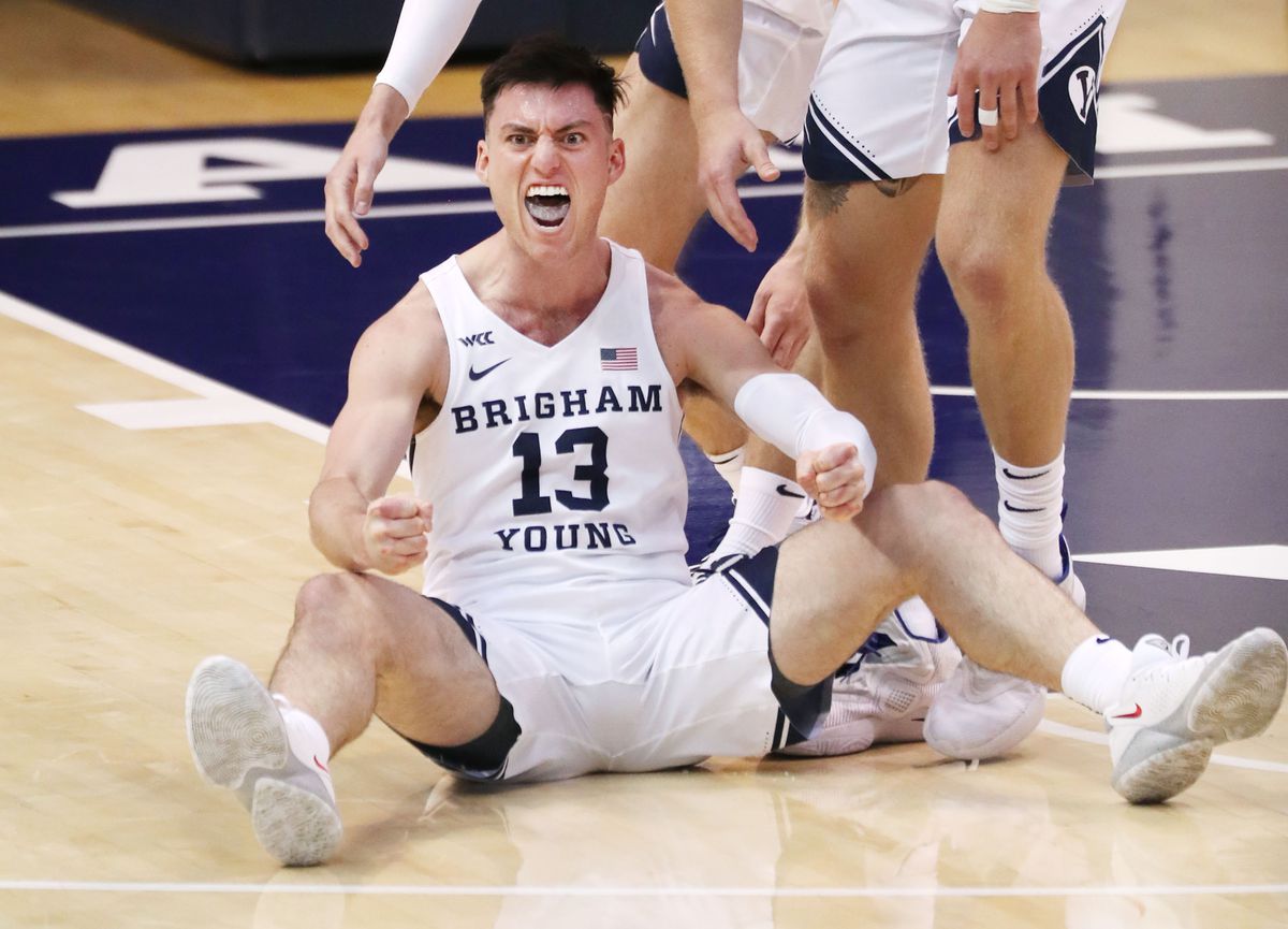 Brigham Young Cougars guard Alex Barcello (13) yells after drawing a foul form the San Francisco Dons in Provo on Thursday, Feb. 25, 2021. BYU won 79-73.