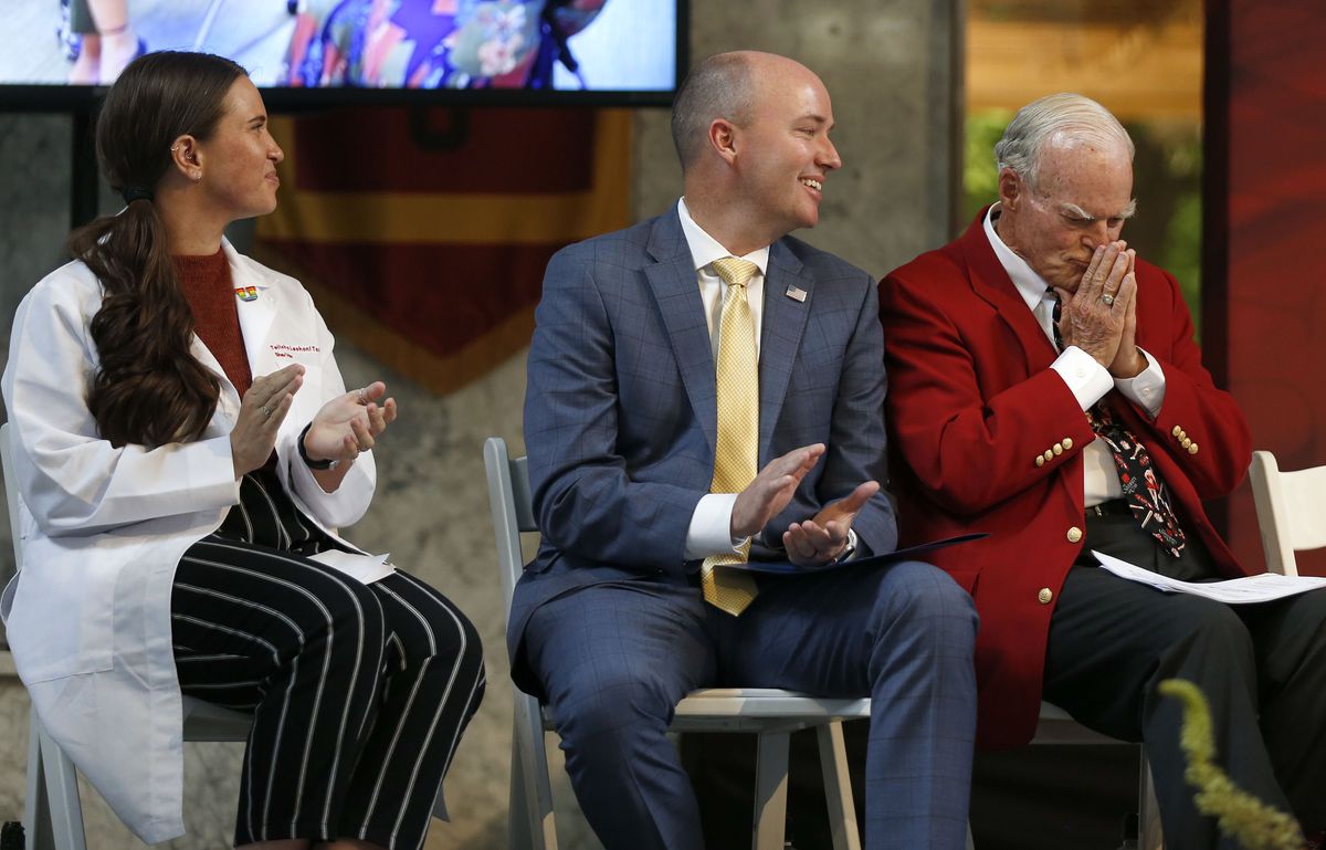 University of Utah medical student Telisha Tausinga, left, and Gov. Spencer Cox applaud Spencer Eccles, chairman and CEO of the George S. and Dolores Doré Eccles Foundation and the Nora Eccles Treadwell Foundation, after the announcement of a landmark gift to the U.’s School of Medicine in Salt Lake City on Wednesday, June 9, 2021. Two Eccles family foundations are giving a combined $110 million to the University of Utah School of Medicine.