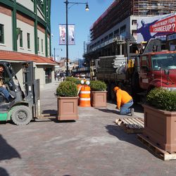 Planter boxes being installed at Clark and Addison