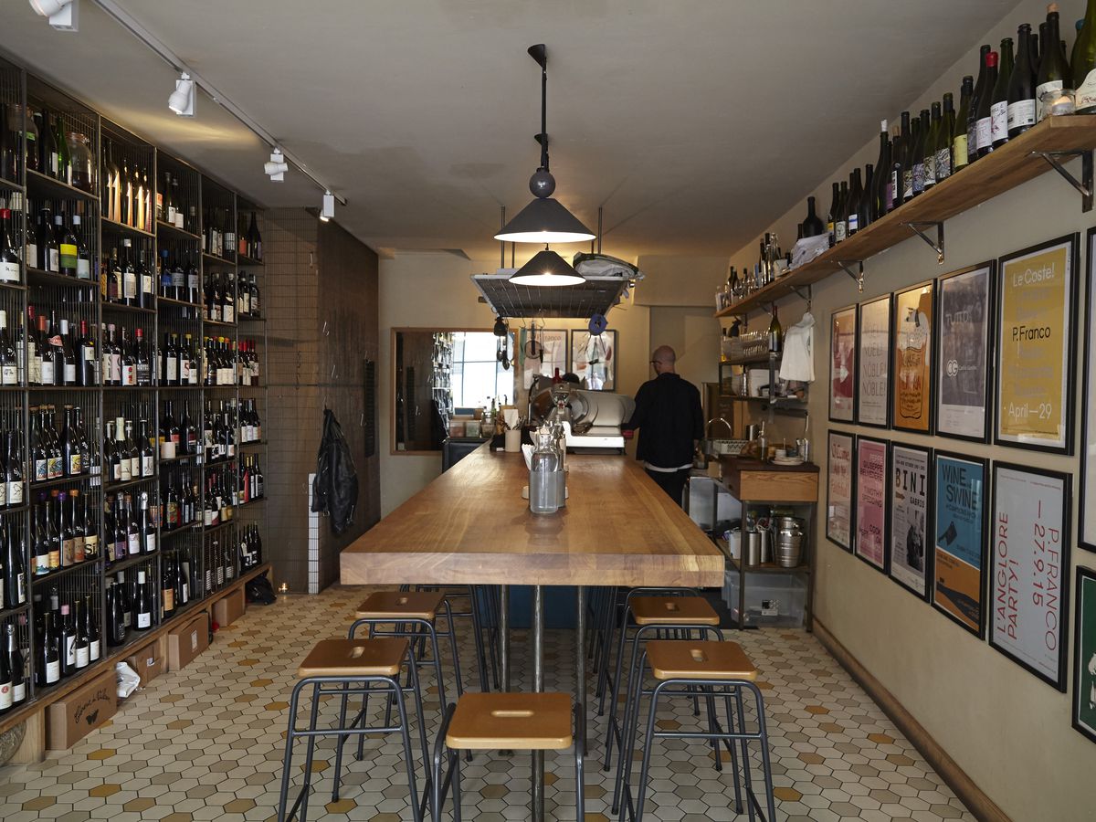 The interior of Lower Clapton wine bar and restaurant P. Franco, that forms part of the best 24 hour restaurant travel itinerary for London — where to eat with one day in the city