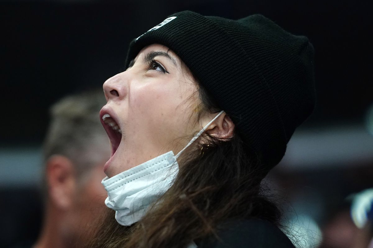 Mar 11, 2020; Los Angeles, California, USA; A Los Angeles Kings fan wears a surgical mask in the first period against the Ottawa Senators at Staples Center.&nbsp;