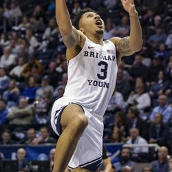 Brigham Young Cougars guard Te’Jon Lucas (3) goes up for a layup as BYU plays Loyola Marymount in an NCAA basketball game at Marriott Center in Provo on Thursday, Feb. 24, 2022.  